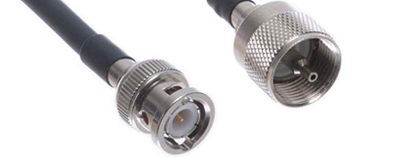 Harnessed COAX cable with high frequency plug connector assembly